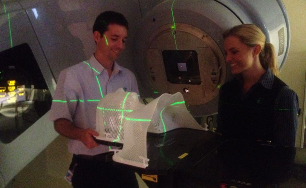 Radiation therapists Peter Neville and Emma Knakes with the new IMRT machine Photo Albert Elzinga / Daily News Radiation therapists Peter Neville and Emma Knakes with the new IMRT machine Photo Albert Elzinga / Daily News